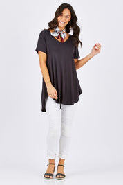 Model Georgia wearing size 10 of the Softly Swinging Bamboo Tee in colour Storm (Grey), from the front, showing the whole outfit