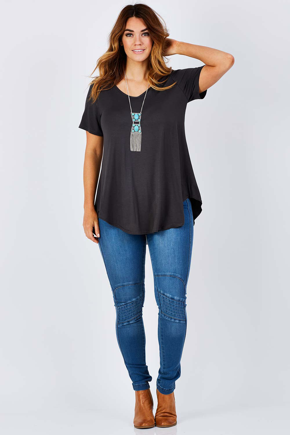 Model Laura wearing size 12 of the Softly Swinging Bamboo Tee in colour Storm (Grey), from the front, showing the whole outfit