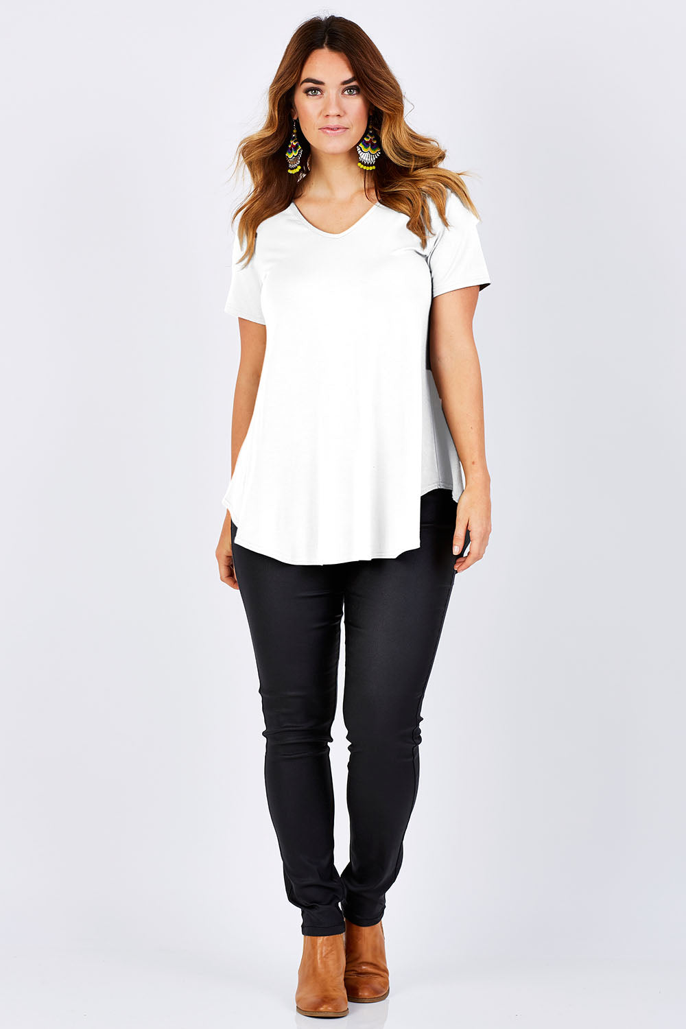 Model Laura wearing size 12 of the Softly Swinging Bamboo Tee in colour White (White), from the front, showing the whole outfit