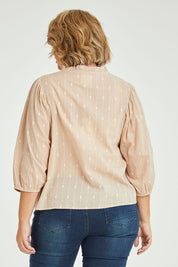 Model Fiona wearing size 16 of the Delighted To Meet You Blouse in colour Sand, from the back