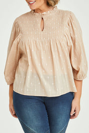 Model Fiona wearing size 16 of the Delighted To Meet You Blouse in colour Sand, from the front, cropped image