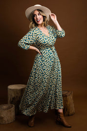 Model Jess wearing size 14 of the Daisy Chain Swing Dress in colour Daisy (Blue), from the front, showing the whole outfit