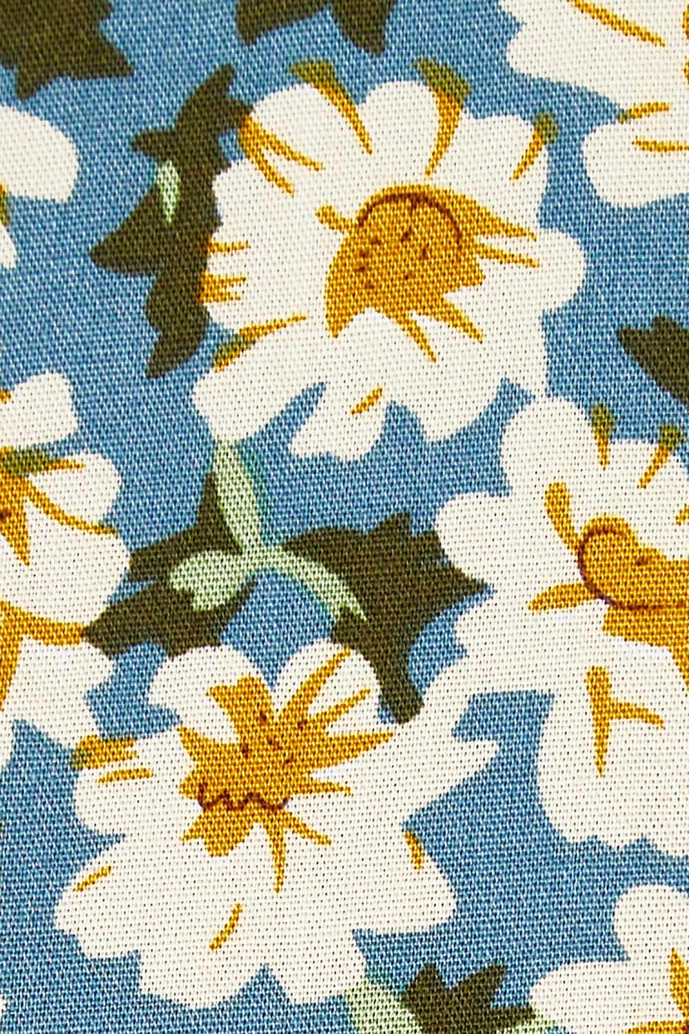 Product shot of the Daisy Chain Swing Dress in colour Daisy (Blue), detail
