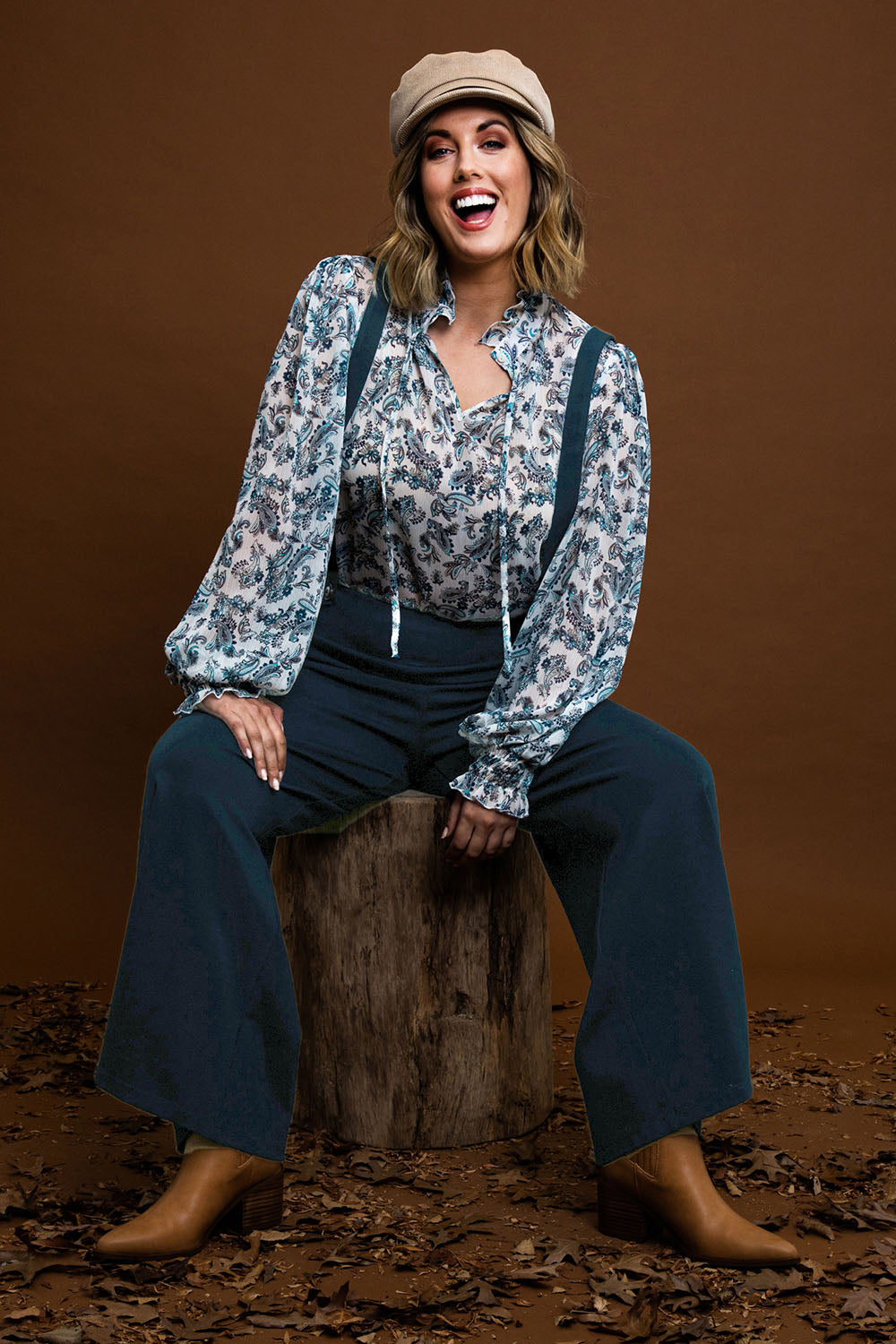 Model Jess wearing size 14 of the Paisley Lady Blouse in colour Whtpaisley (White), from the front, showing the whole outfit