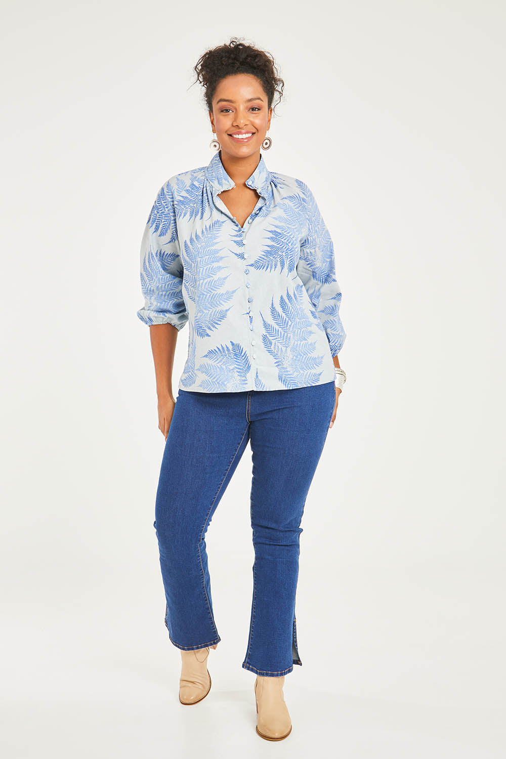 Model Noli wearing size 14 of the Fern Fair Cotton Blouse in colour Bluefern (Blue), from the front, showing the whole outfit