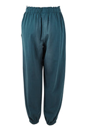 Product shot of the Dawn Break Relaxed Pants in colour Ocean (Blue), from the back