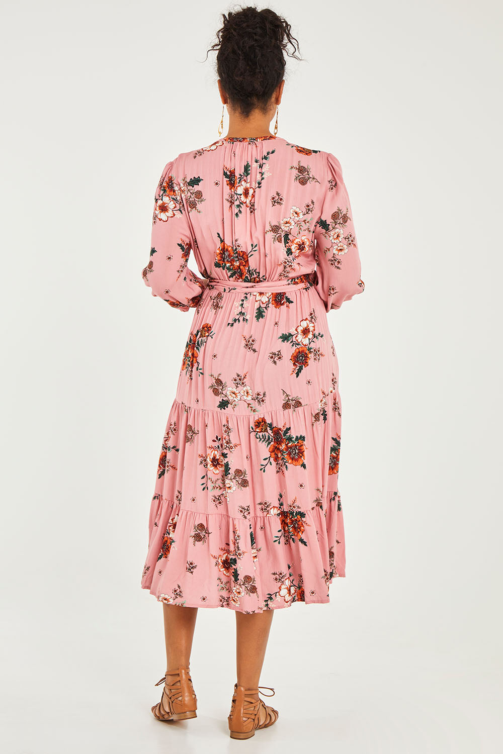Model Noli wearing size 14 of the Pocket Full Of Dreams Wrap Dress in colour Hibiscus (Pink), from the back