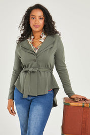 Model Noli wearing size 14 of the Femme Fatale Ponte Jacket in colour Moss (Green), from the front, cropped image