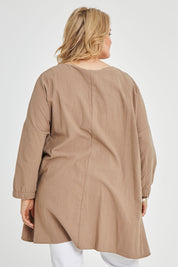 Model Keeara wearing size 16 of the Good Times Gather Top in colour Latte, from the back