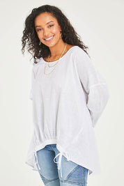 Model Noli wearing size 14 of the Good Times Gather Top in colour Offwhite (White), from the back