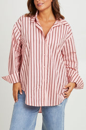 Model Monique wearing size 14 of the Relaxed Elegance Boyfriend Shirt in colour Pinkstripe (Pink), from the front, cropped image