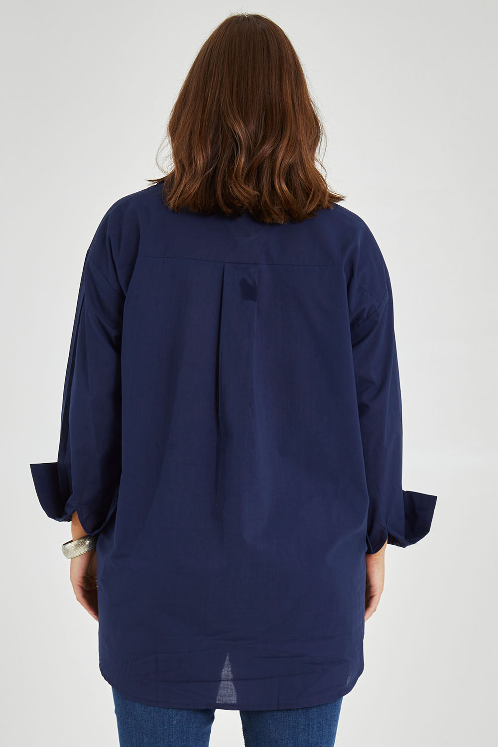 Model Monique wearing size 14 of the Relaxed Elegance Boyfriend Shirt in colour Inknavy (Blue), from the back