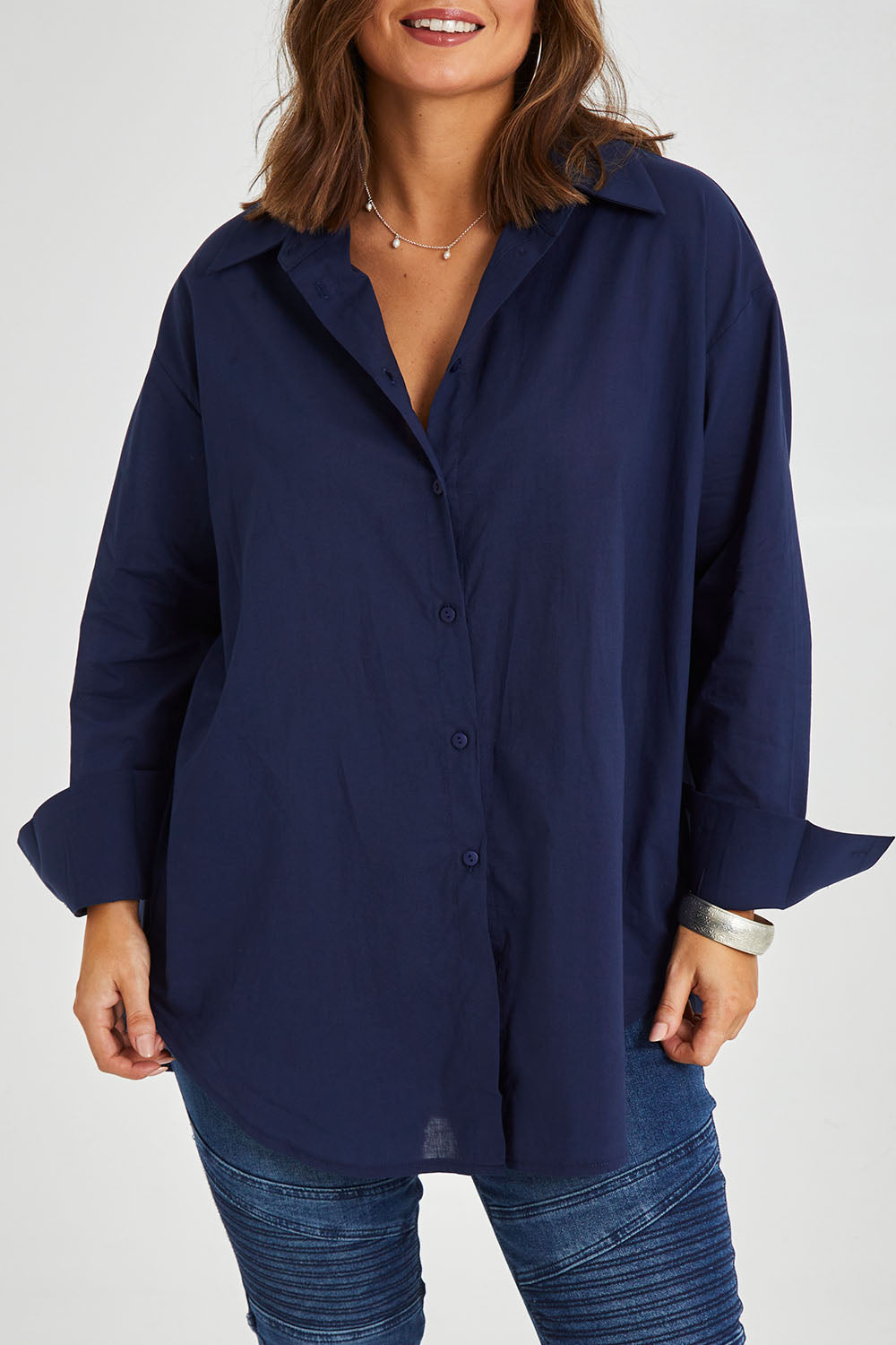 Model Monique wearing size 14 of the Relaxed Elegance Boyfriend Shirt in colour Inknavy (Blue), from the front, cropped image