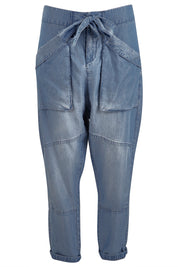 Product shot of the With My Tribe Pants in colour Denim (Blue), from the front