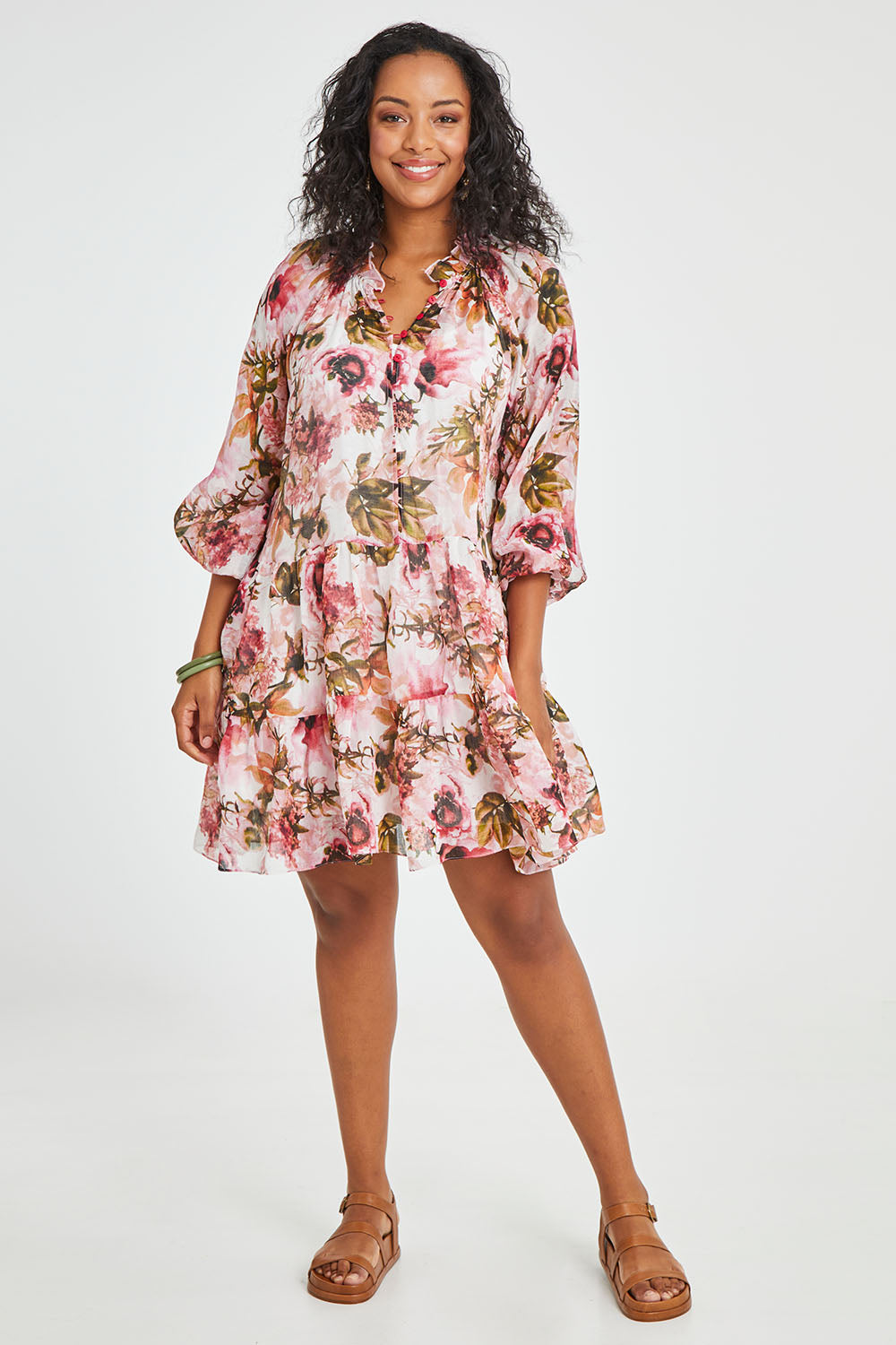 Model Noli wearing size 14 of the Down The Garden Path Dress in colour Fleur (Pink), from the front, showing the whole outfit