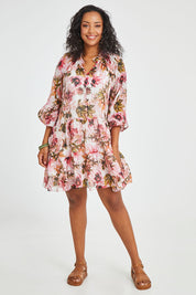 Model Noli wearing size 14 of the Down The Garden Path Dress in colour Fleur (Pink), from the front, showing the whole outfit