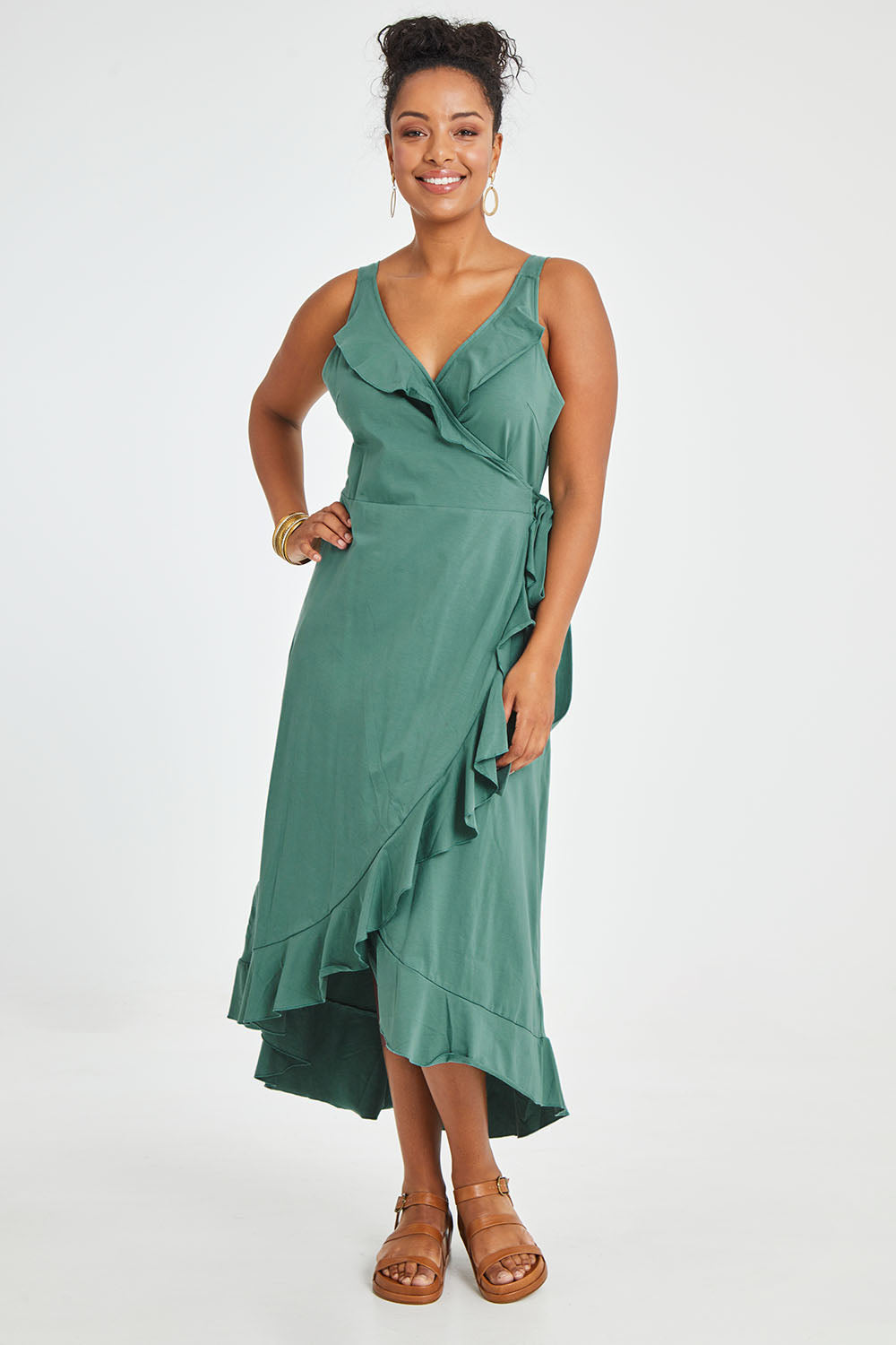 Model Noli wearing size 14 of the Preloved Thats A Wrap Mercerised Cotton Dress in colour Fern (Green), from the front, showing the whole outfit