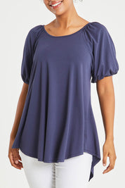 Model Noli wearing size 14 of the Sweet Melody Bamboo Tee in colour Navy (Blue), from the front, cropped image