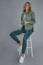 Model Alice wearing size 10 of the Wild Plains Flat Front Stitch Jeggings in colour Darkdenim (Blue), from the front, showing the whole outfit