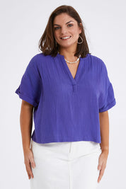Model Monique wearing size 14 of the Every Other Day Cotton Blouse in colour Blue (Blue), from the front, cropped image
