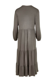 Product shot of the Tiered Delight Bamboo Dress in colour Combat (Green), from the back