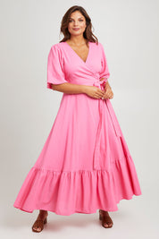 Model Monique wearing size 14 of the La Dolce Vita Puff Sleeve Dress in colour Bubblegum (Pink), from the front, showing the whole outfit