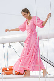 Model Tegan wearing size 10 of the La Dolce Vita Puff Sleeve Dress in colour Bubblegum (Pink), from the front, showing the whole outfit