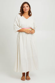 Model Monique wearing size 14 of the Daydream Cotton Kaftan Dress in colour Wheat, from the front, showing the whole outfit