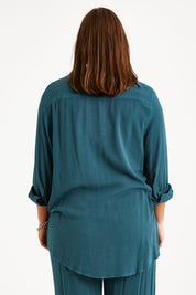 Model Monique wearing size 14 of the Brunch Lunch And Dinner Pants in colour Sage (Green), from the back