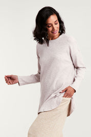 Model Natalie wearing size 8 of the Easy Vibes Ribbed Top in colour Natural, from the front, cropped image