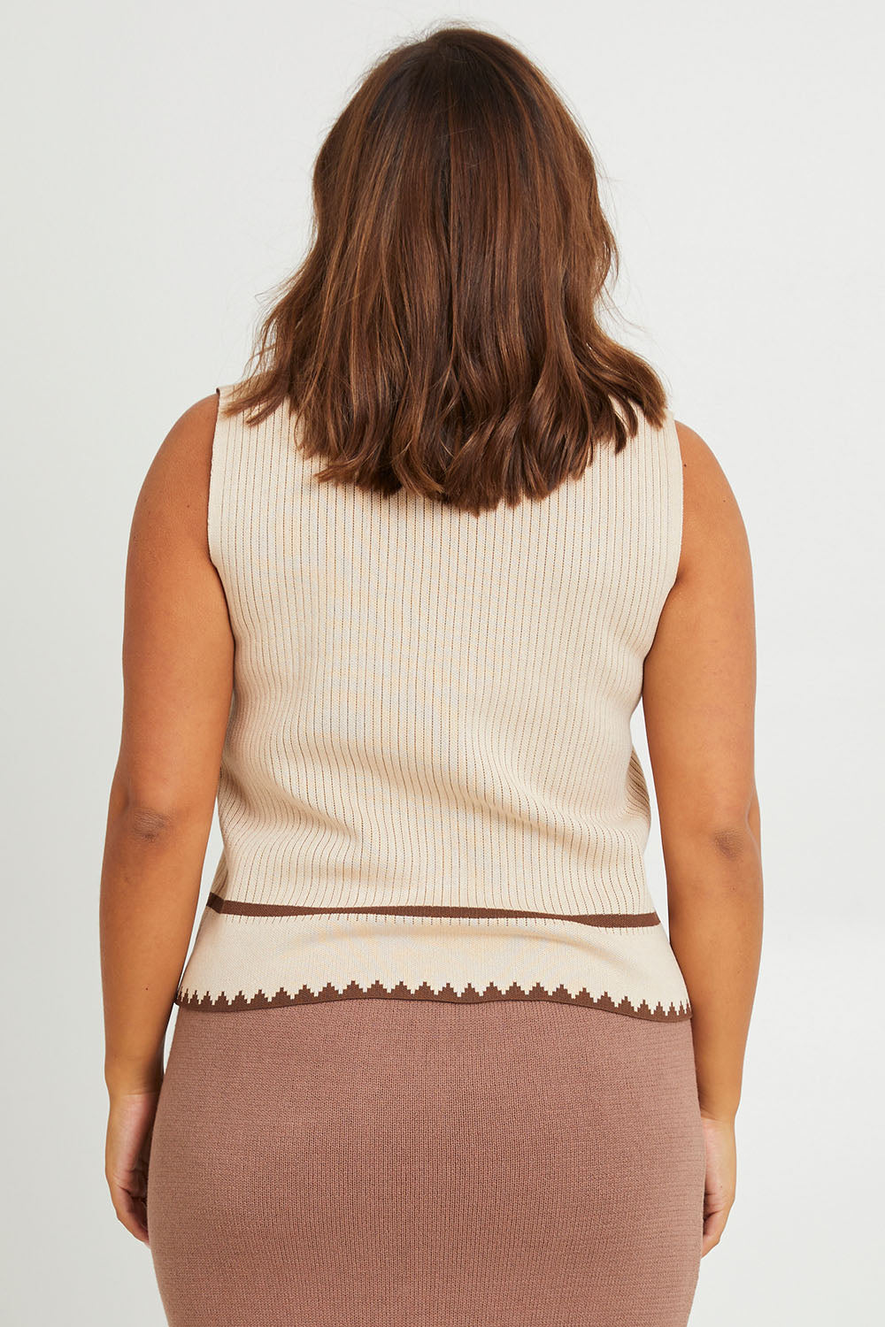 Model Monique wearing size L of the Always Classic Knit Tank in colour Wheatchoc, from the back