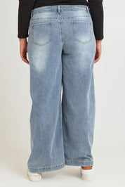 Model Chanel wearing size 16 of the Always There For Me Boyfriend Jeans in colour Denim (Blue), from the back