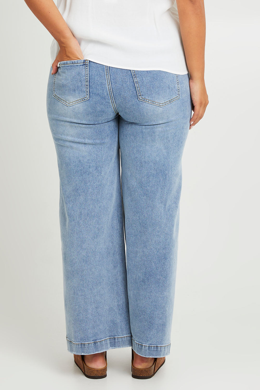 Model Monique wearing size 14 of the Always There For Me Boyfriend Jeans in colour Denim (Blue), from the back