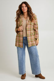 Model Laura wearing size 14 of the Check Me Out Cotton Blazer in colour Check (Green), from the front, showing the whole outfit