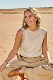 Model Tegan wearing size S of the Go To Knit Crew Tank in colour Natural, from the front, showing the whole outfit