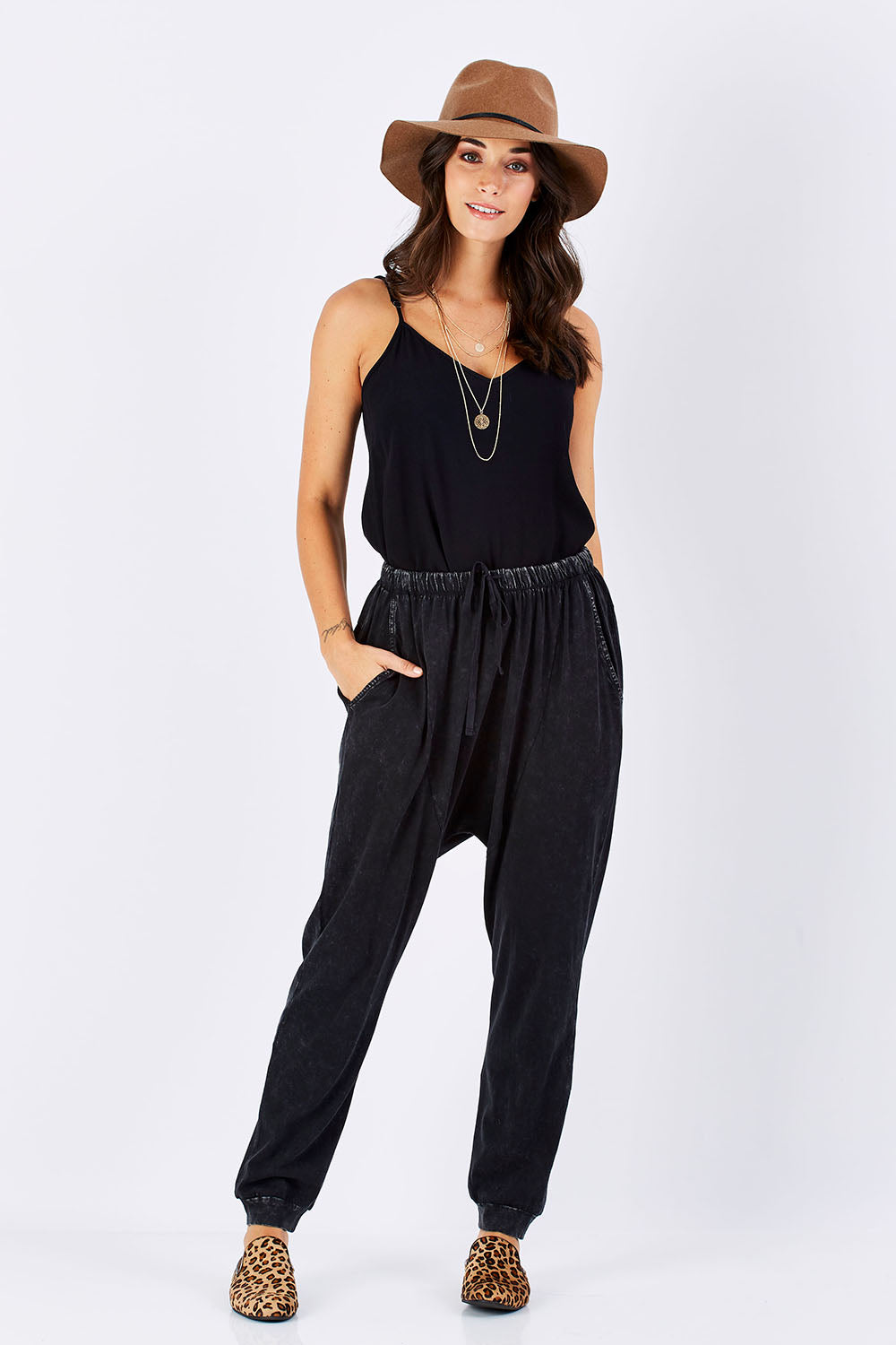 Model Georgia wearing size 10 of the Hunt And Gather Pants in colour Black (Black), from the front, showing the whole outfit