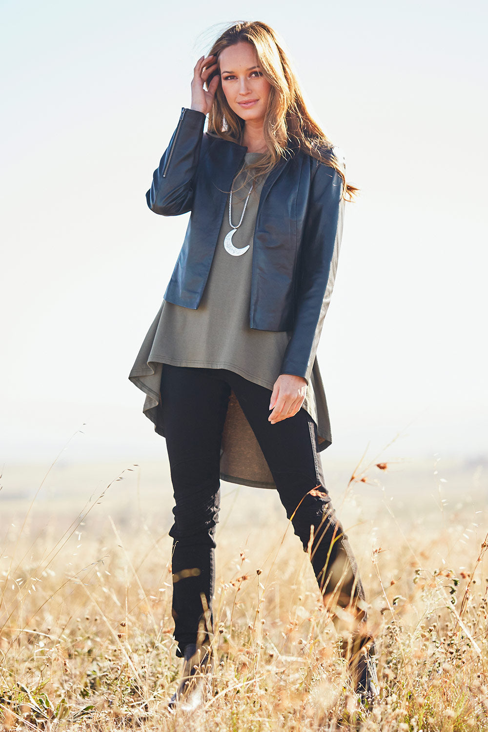 Model Emma wearing size 10 of the Forever Leather Jacket in colour Black (Black), from the front, showing the whole outfit