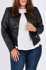 Model Mae wearing size 18 of the Forever Leather Jacket in colour Black (Black), from the front, cropped image