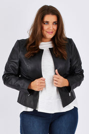 Model Mae wearing size 18 of the Forever Leather Jacket in colour Black (Black), from the front, cropped image