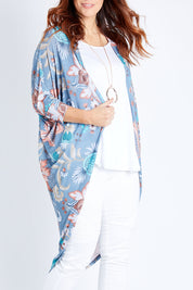 Model Laura wearing size 14 of the Falling For You Cardi in colour Denim (Blue), from the front, cropped image