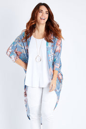 Model Laura wearing size 14 of the Falling For You Cardi in colour Denim (Blue), from the front, cropped image