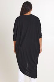 Model Ashleigh wearing size 16 of the Falling For You Cardi in colour Black (Black), from the back