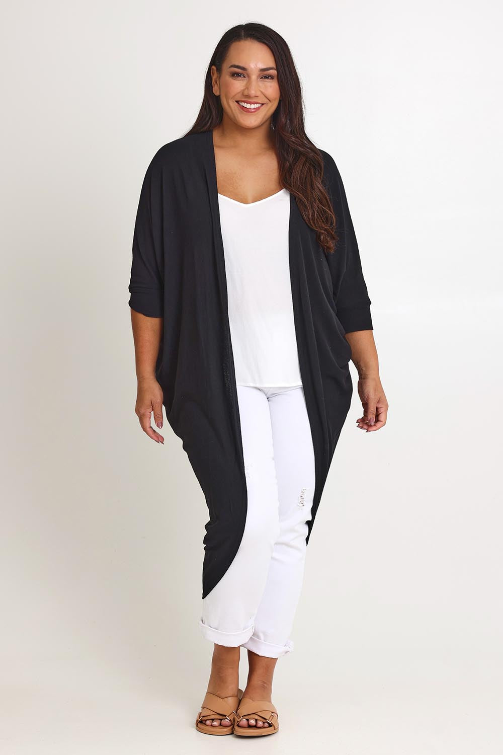 Model Ashleigh wearing size 16 of the Falling For You Cardi in colour Black (Black), from the front, showing the whole outfit