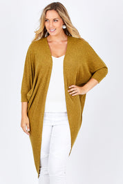 Model Jess wearing size 14 of the Falling For You Cardi in colour Mustard, from the front, cropped image