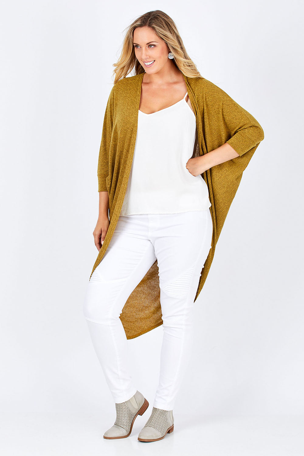 Model Jess wearing size 14 of the Falling For You Cardi in colour Mustard, from the front, showing the whole outfit