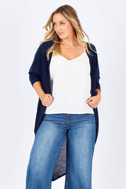 Model Jess wearing size 14 of the Falling For You Cardi in colour Navy (Blue), from the front, cropped image