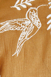 Product shot of the Dancing With Birds Midi Dress in colour Clay, detail
