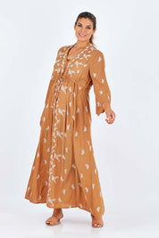 Model Palatina wearing size 14 of the Dancing With Birds Dress in colour Golden, from the front, showing the whole outfit