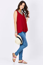 Model Georgia wearing size 10 of the Sugar Snaps Layers Tank in colour Red (Red), from the front, showing the whole outfit