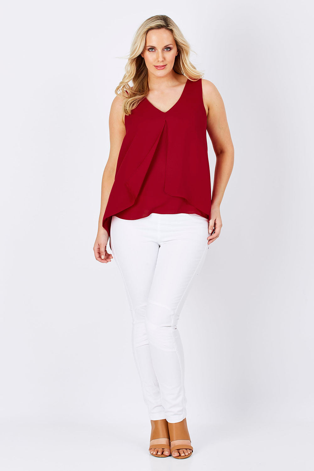 Model Jess wearing size 12 of the Sugar Snaps Layers Tank in colour Red (Red), from the front, showing the whole outfit